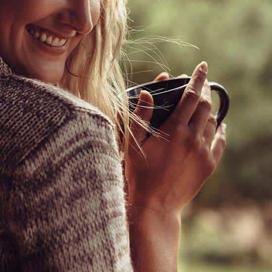 Woman with a cup of coffee